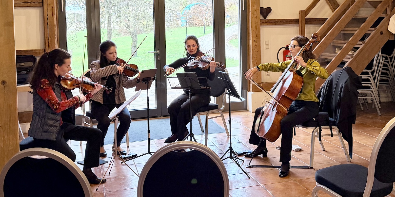 Leaders and professional musicians in a musical group coaching session